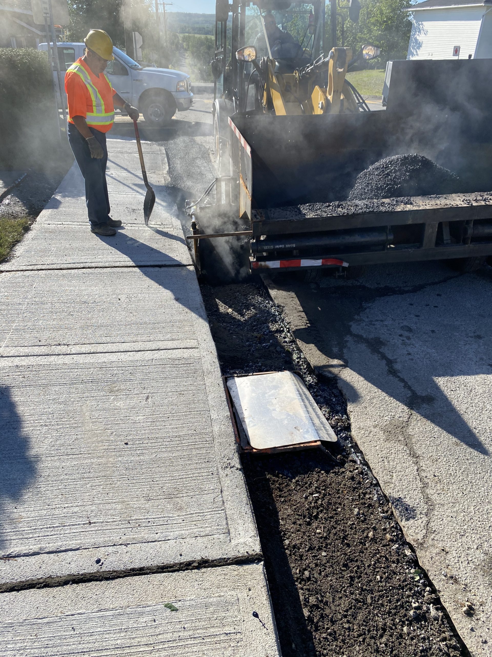 Rapid Paver performing paving on a trench